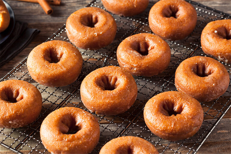 Glazed donuts on rack