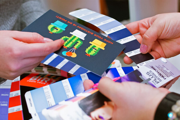 comparing pantone color books to printed postcard