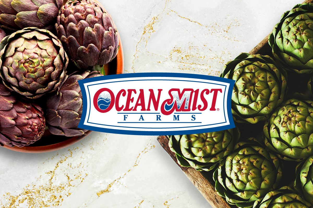 Ocean Mist Farms logo on background image of marble countertop with a box of green artichokes and a bowl of purple artichokes