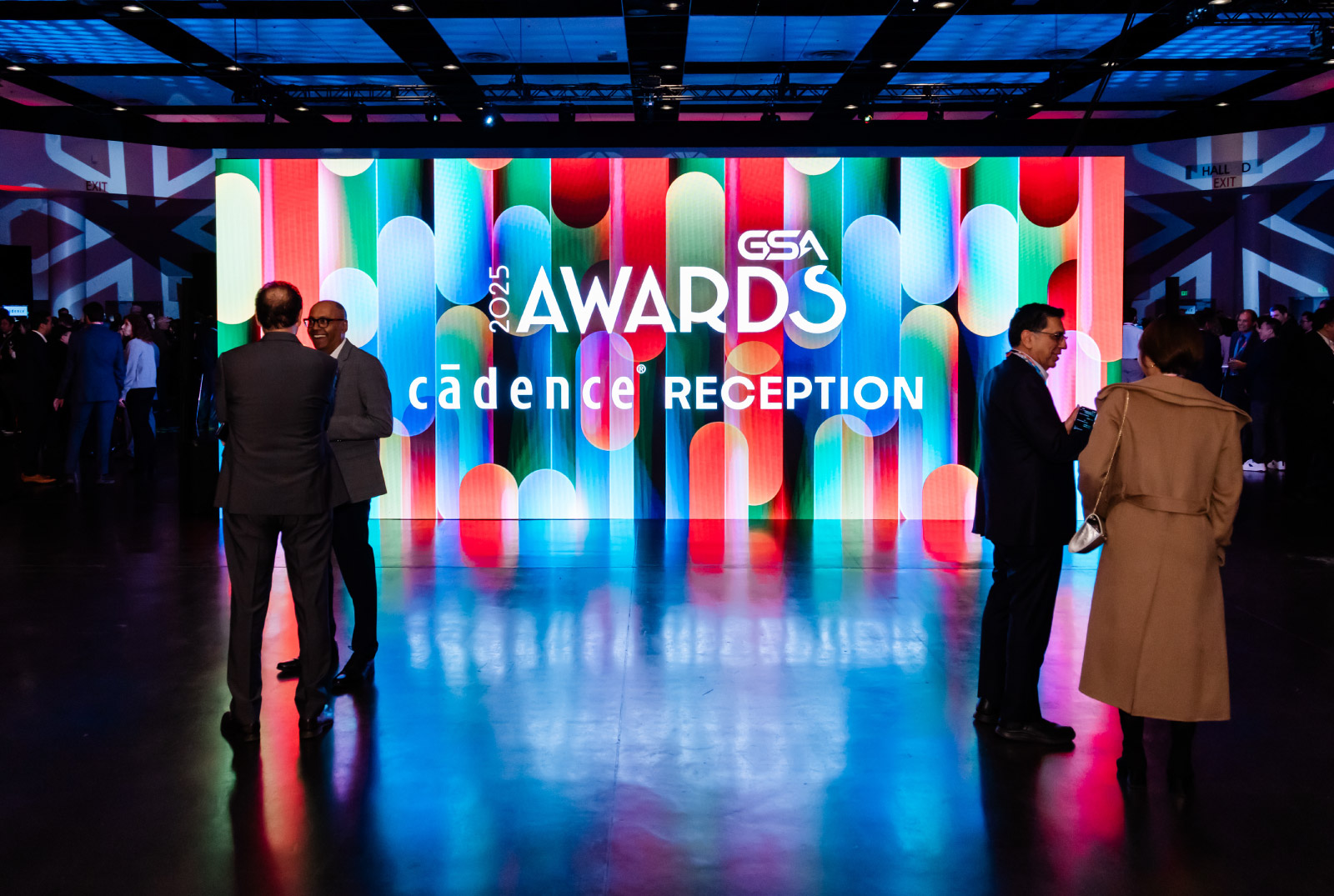 People gathered around a sign with the 2025 GSA Awards Celebration branding