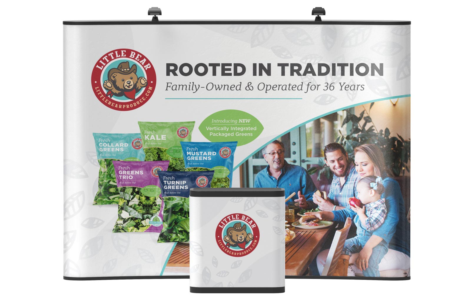 Little Bear trade show booth with podium. Booth backdrop reads" Rooted In Tradition: Family-Owned and Operated for 36 Years"